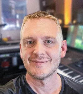 Stuart with the studio in the background