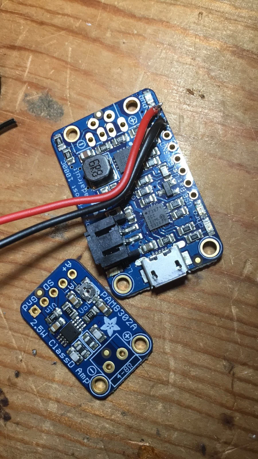 The PowerBoost 1000C charging board and the mono amplifier