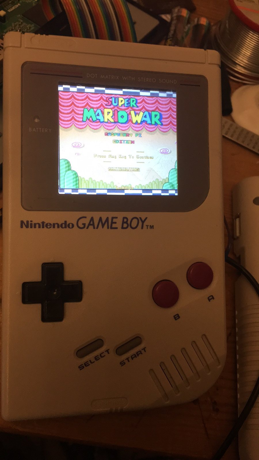 The finished BerryBoy showing the Super Mario War title screen
