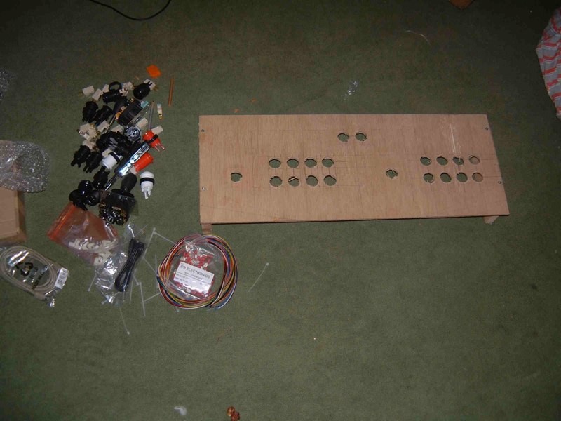 Control panel with holes cut and buttons ready to fit