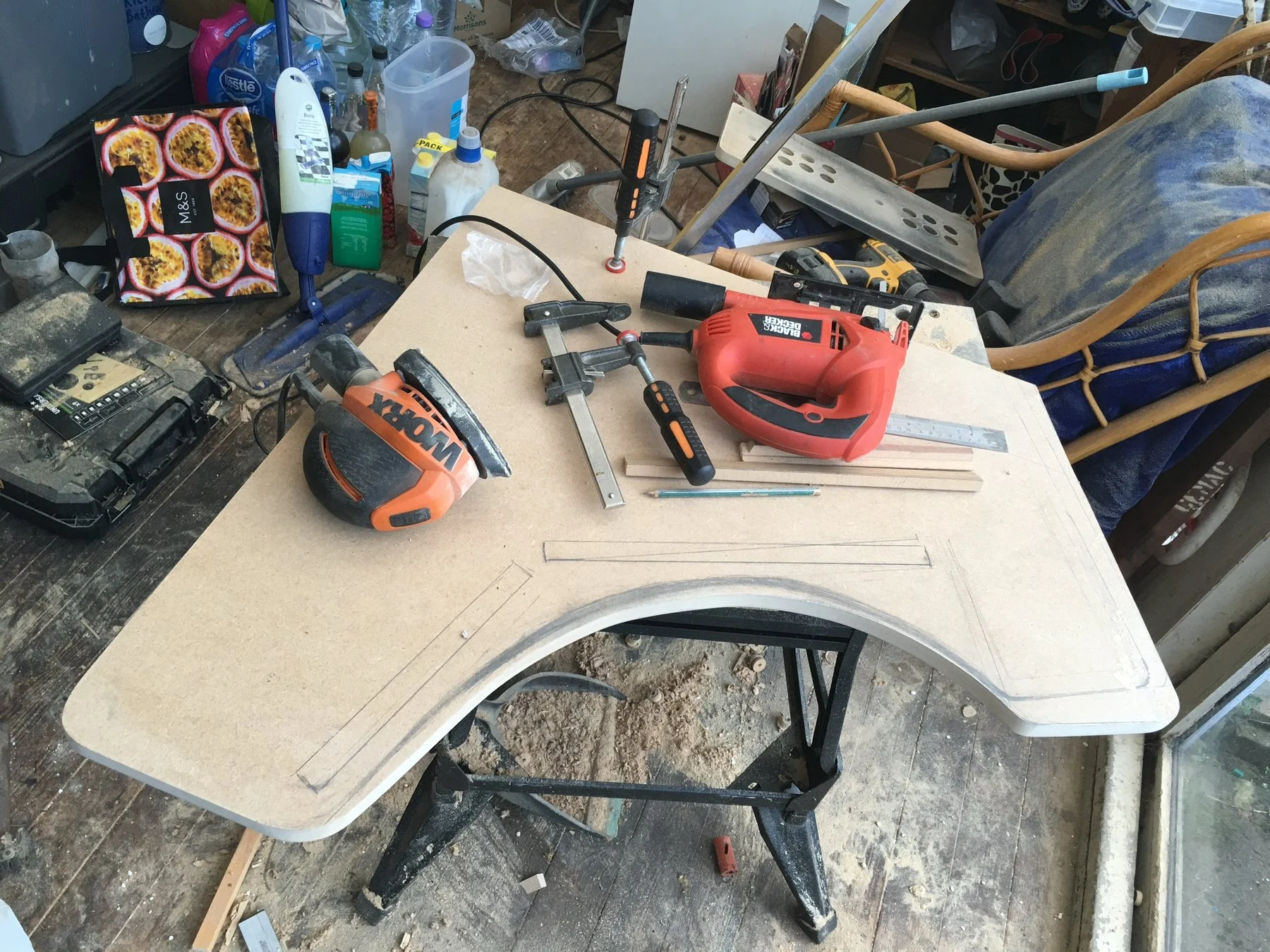 A side panel with pencil lines marking where the internal panels sit