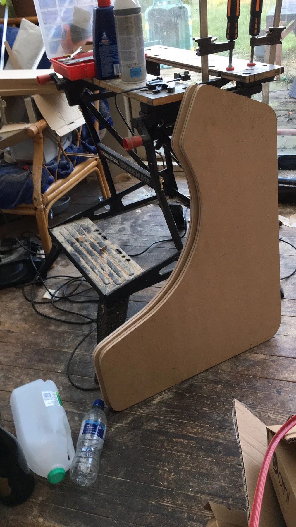 Both side panels stacked together against the workbench